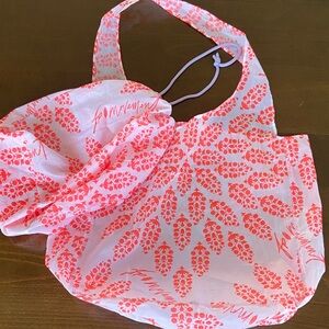 Pink Coral & White Reusable Tote with cinch bag for personal items.FP Movement